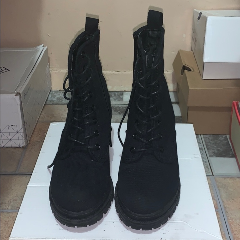 Heel combat boots.